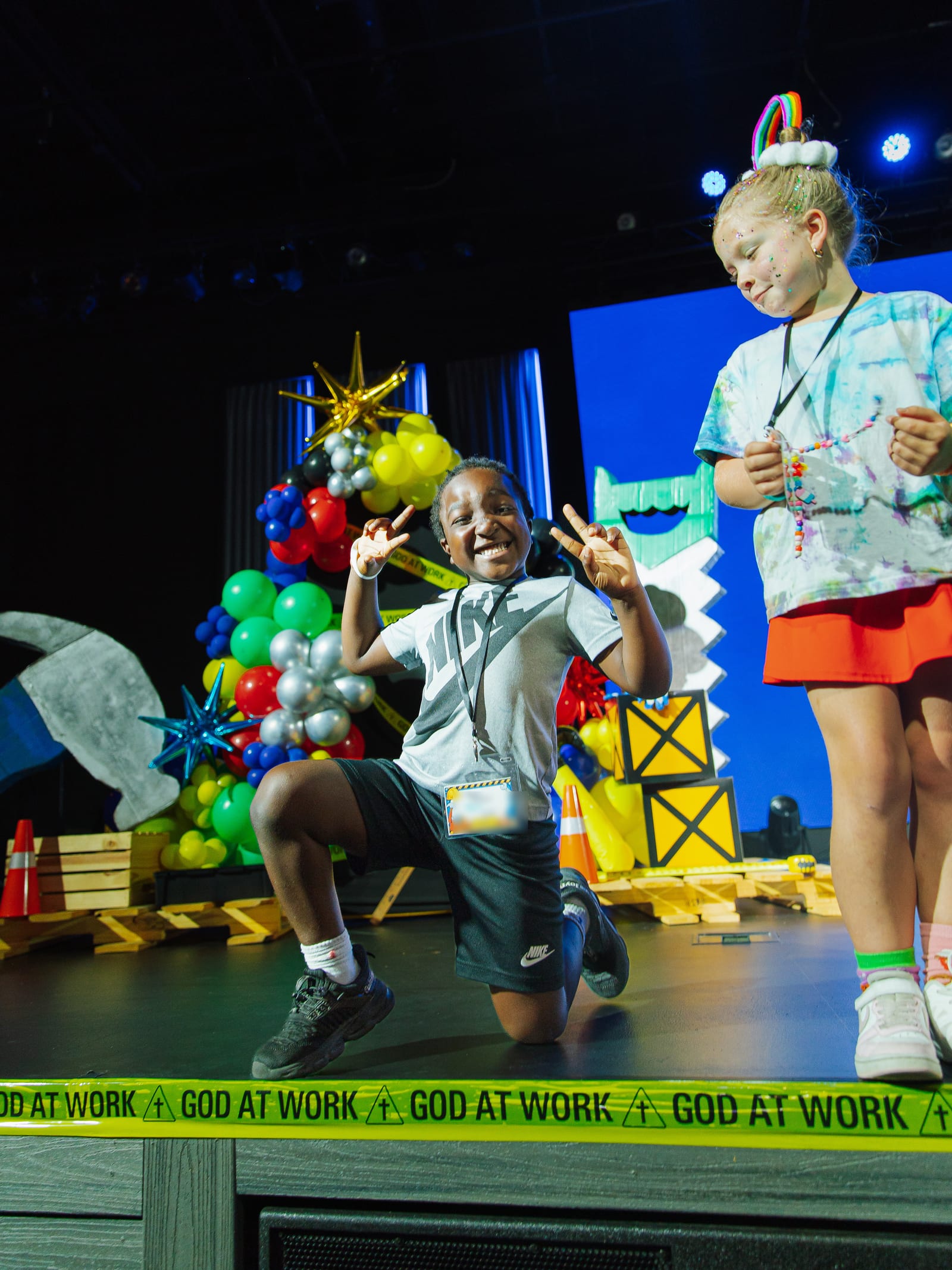Children learning and moving together in a New Hope Kids classroom