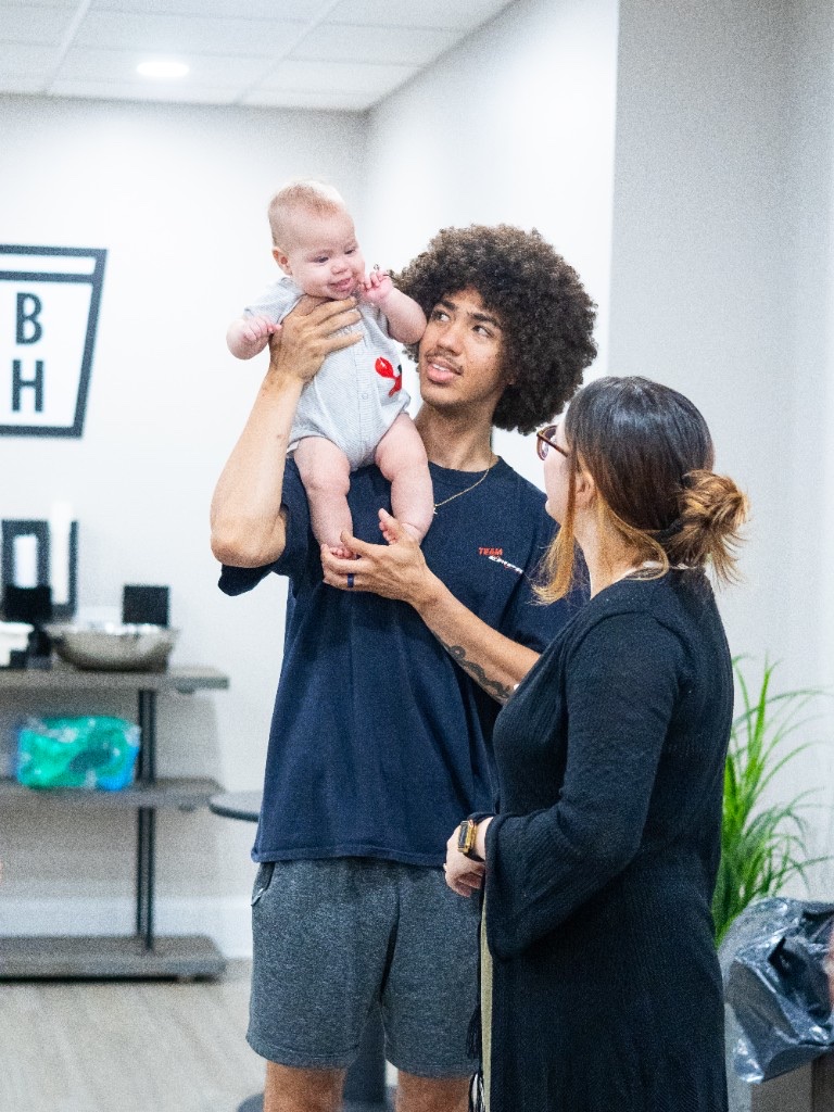 A young married couple with their baby at New Hope