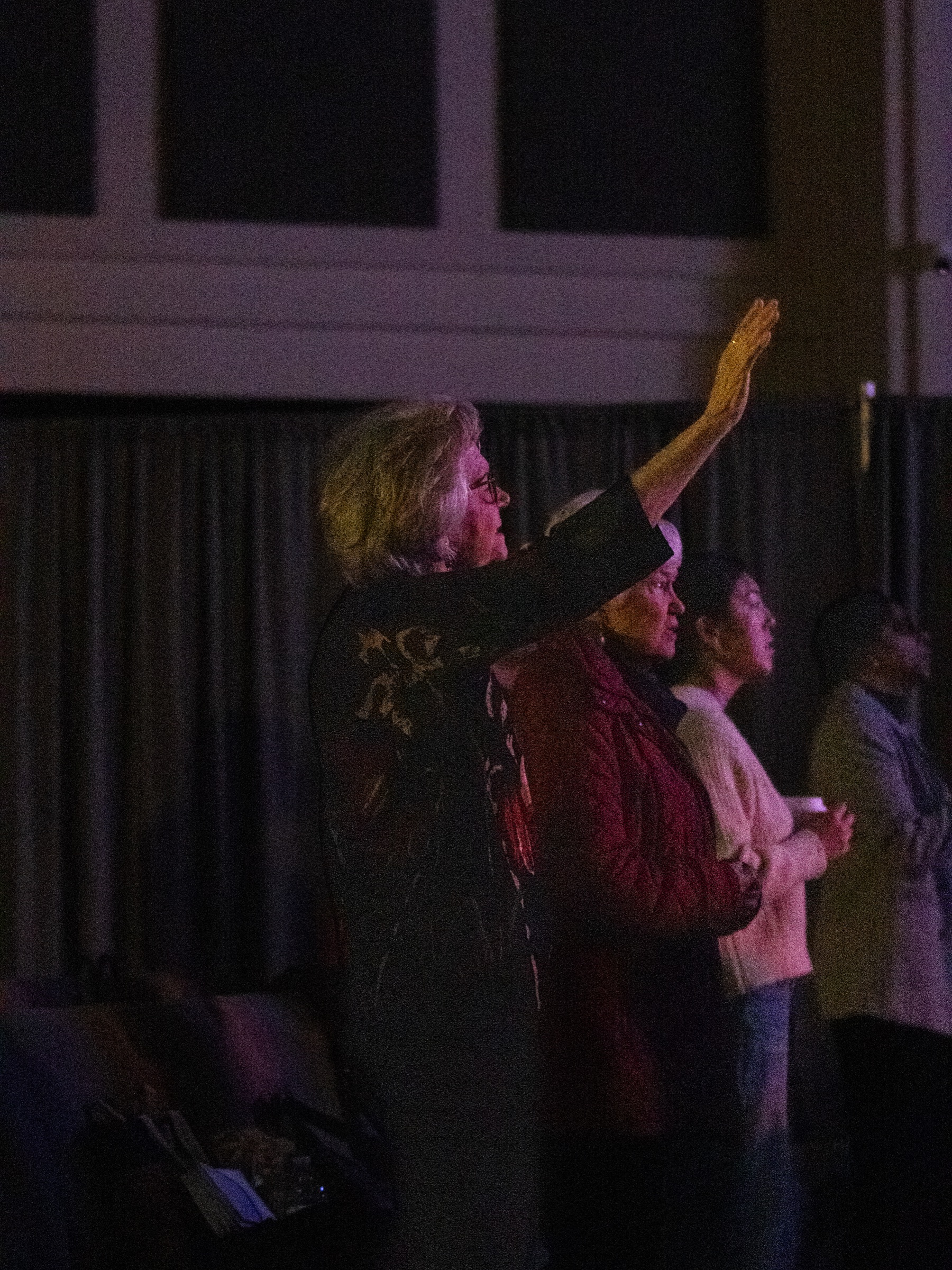 A regional relief team praying together