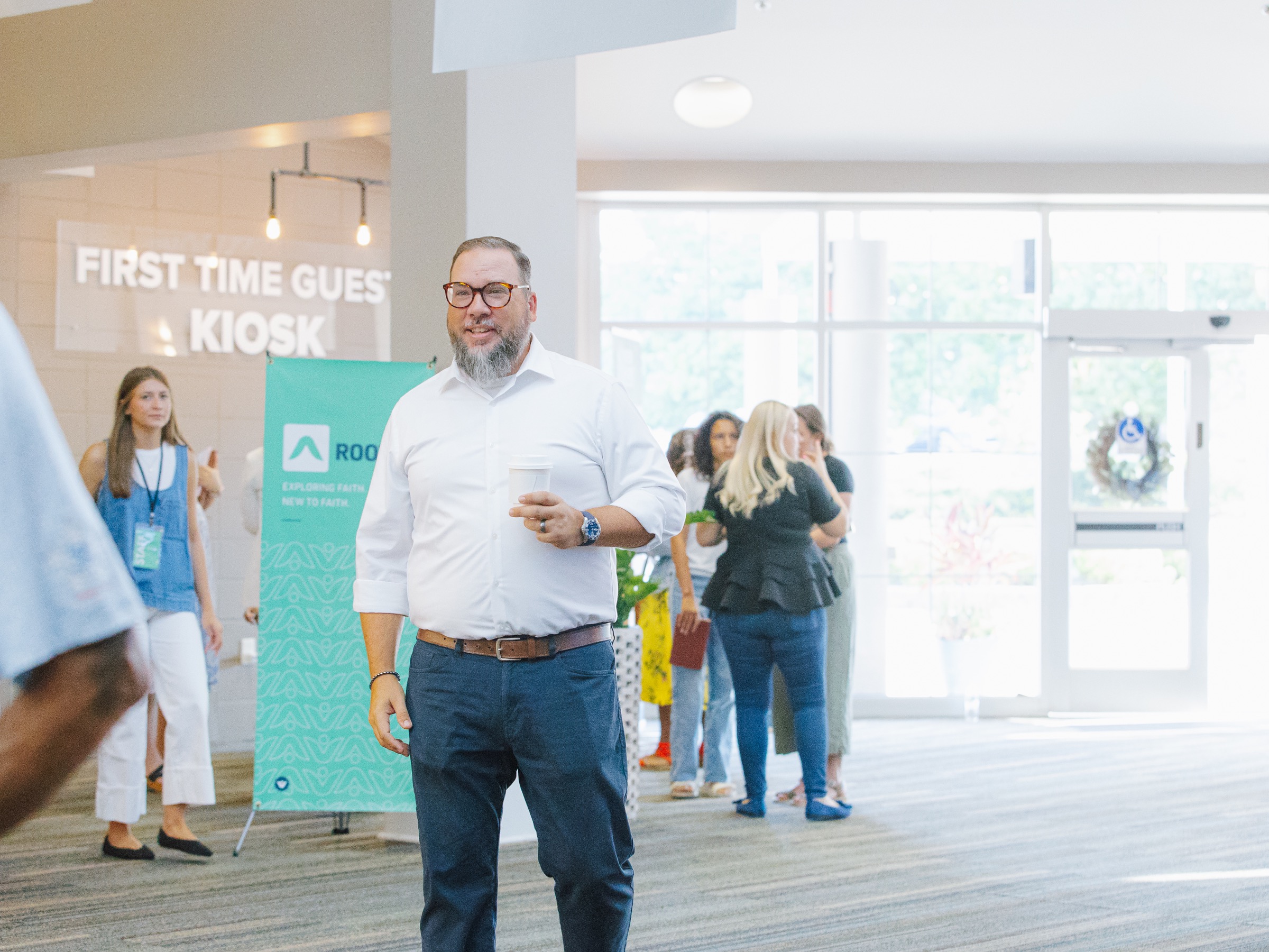 Guests welcomed in the New Hope lobby during Sunday morning