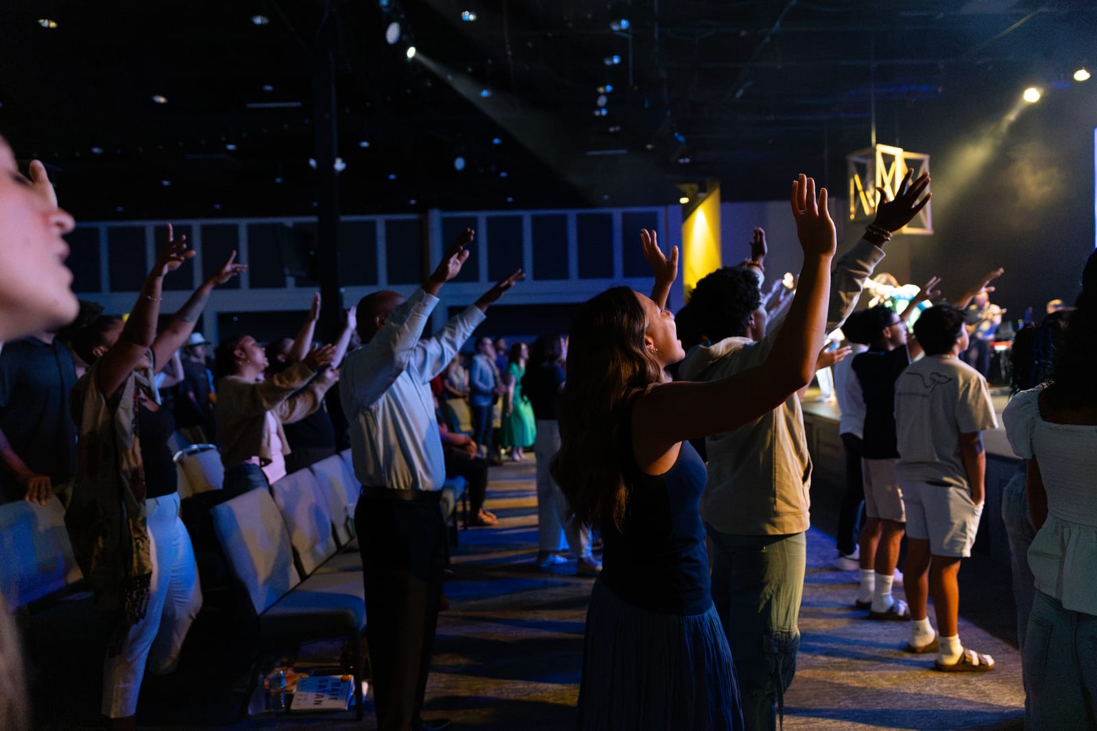 People worshiping together during a New Hope service